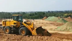 لودر بعجلات أثناء تسوية الأرض، سلسلة ZL30H
